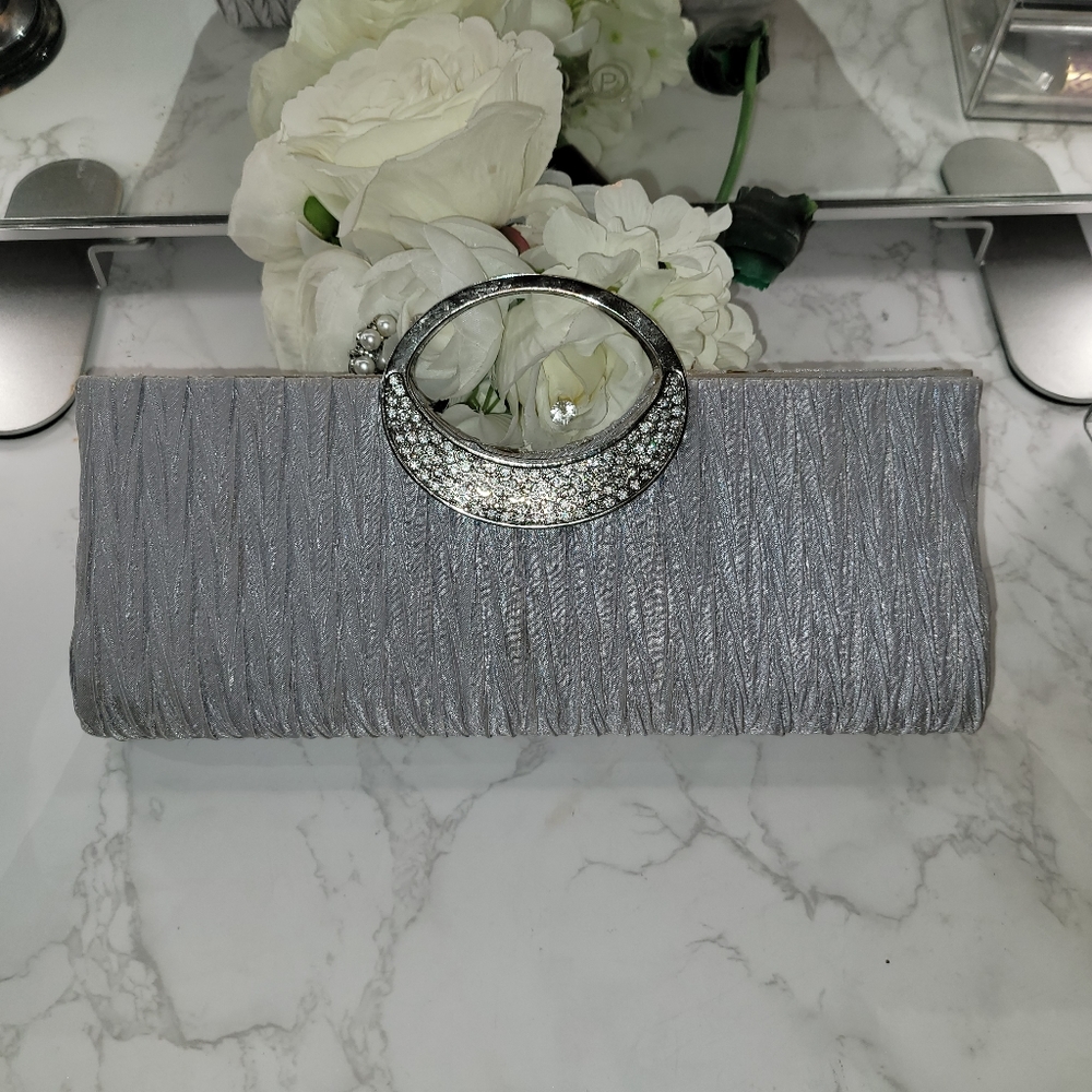 Silver clutch with bling handle